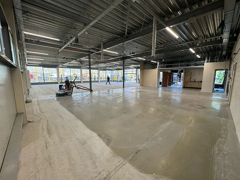 beton vloer vlak maken hardemanvloerbewerking
