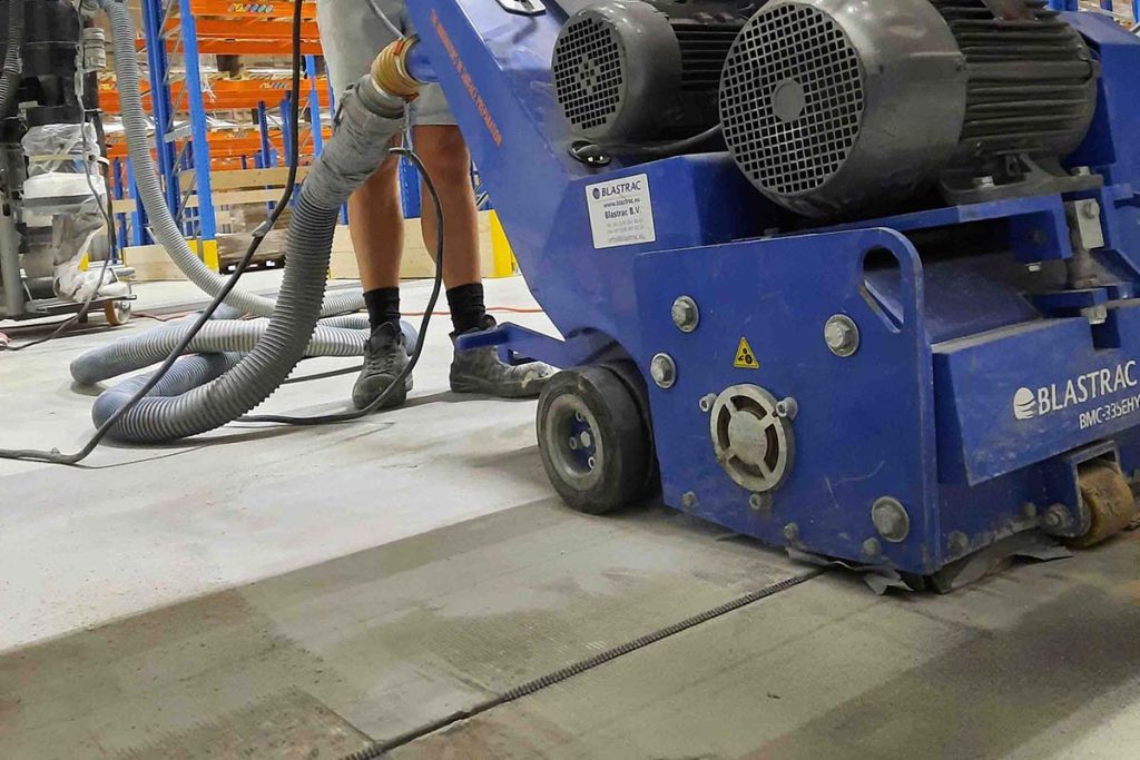 Oneffen betonvloer